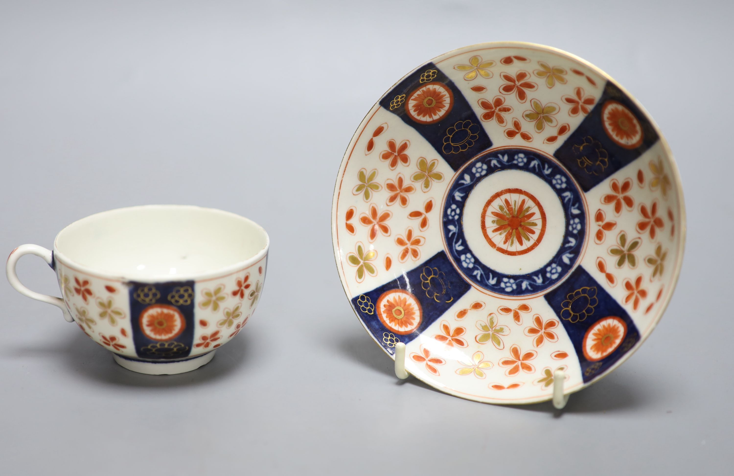 An 18th century Worcester cup and saucer painted with the Old Japan Star pattern, diameter 13cm